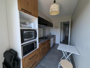 Appartement F2 rez-de-jardin