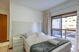 Apto 3Q c varanda - 240m do mar Meia Praia EIO203