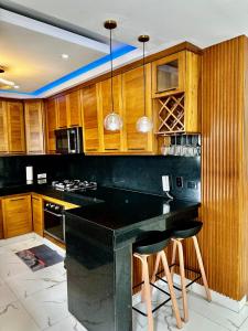 casa con piscina cerca de la playa Caleta 8 mnt de casa de campo Residencial los garcia la romana