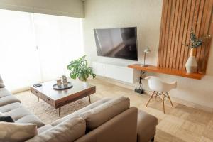 Departamento Mayan Island - A pie de playa y con albercas