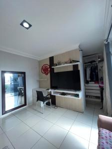 Casa confortável em condomínio de luxo