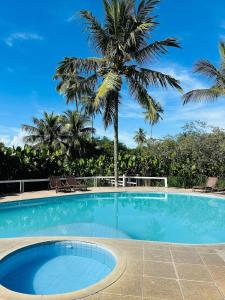 Apartamento com piscina e acesso exclusivo à praia Ambiente confortável, com colchões e travesseiros de qualidade, em uma localização estratégica, perto de tudo para você aproveitar sem precisar de carro