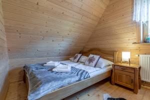 Osada Szaflary - jacuzzi na wyłączność dla każdego domku, ogólnodostępna sauna i plac zabaw w cenie