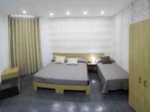 Superior Triple Room room in Abraxia Guest House