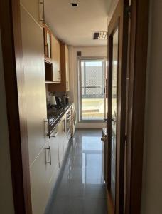 Suave Mar Flat by TonsdeVerde