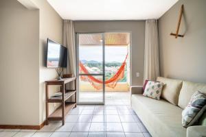 Apto c varanda e churrasq. a 450m do Mar REH0203