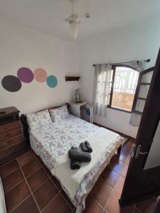 Casa arara suite 5 com Piscina para relaxar Estacionamento gratuito e Café da manhã self-service para começar bem o dia Comodidade e ótima localização 100 passos da praia