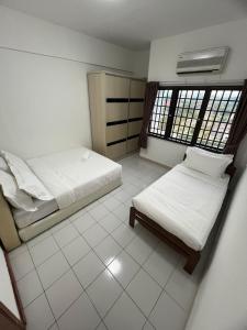 Likas Square Serviced Apartment - garden view with 3bedrooms for 9pax by Kocy Homestay