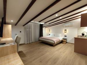 Meteora Gold and Glass Loft