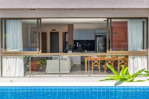 Seu refúgio à poucos passos da Praia e da Vila!