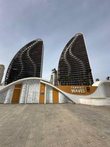 Sunset Waves V by Terreta Rentals