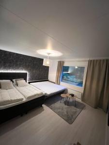 Helmi Villa, keskellä Vuokatti Sauna Ilmainen Pysäköinti Wi-Fi 75 smartTV omapiha