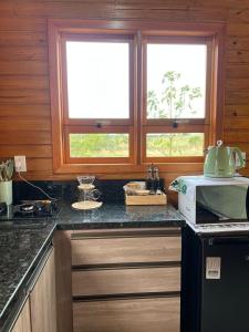 Chalé Tiny house com banheira e lareira