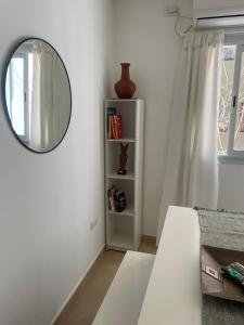 Cerquita del río con alma de hogar