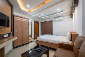 Hotel Staymax Trend kannur