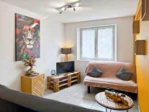 Logement de 40m2 de plein pieds dans une maison avec parking et terrasse