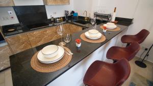 Best Stays Luxury Apartments at Tulip Residences - Beachfront, AC, Lift, Pools