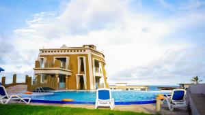 Best Stays Luxury Apartments at Tulip Residences - Beachfront, AC, Lift, Pools