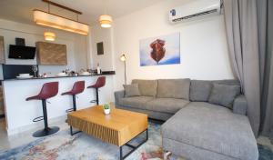 Best Stays Luxury Apartments at Tulip Residences - Beachfront, AC, Lift, Pools