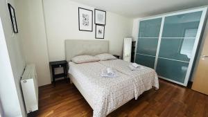 Priestranný apartmán blízko centra