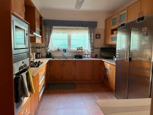 Vivenda espaçosa com jardim e churrasqueira