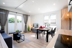 Ostseecamp Ferienhaus "Quartier 104"