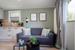 Ostseecamp Ferienhaus "Quartier 104"