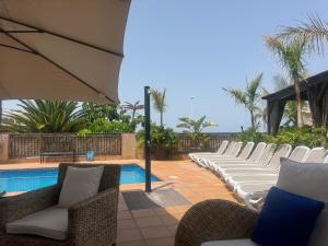 VILLA BLOSSOM in the beautiful area of Puerto Santiago Tenerife with 5 bedrooms for up to 10 guests private swimming pool and many other activities to entertain the family Secure parking for 2 cars and disabled access throughout