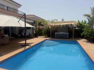 VILLA BLOSSOM in the beautiful area of Puerto Santiago Tenerife with 5 bedrooms for up to 10 guests private swimming pool and many other activities to entertain the family Secure parking for 2 cars and disabled access throughout