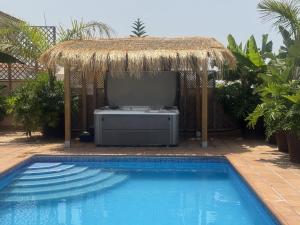 VILLA BLOSSOM in the beautiful area of Puerto Santiago Tenerife with 5 bedrooms for up to 10 guests private swimming pool and many other activities to entertain the family Secure parking for 2 cars and disabled access throughout