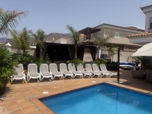 VILLA BLOSSOM in the beautiful area of Puerto Santiago Tenerife with 5 bedrooms for up to 10 guests private swimming pool and many other activities to entertain the family Secure parking for 2 cars and disabled access throughout