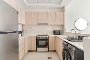 VayK - Prestigious 1BR Apartment in Dubai Hills Estate