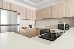 VayK - Prestigious 1BR Apartment in Dubai Hills Estate