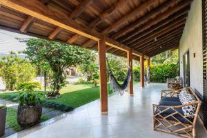 Casa dentro cond. Tenório à 50mts pé areia, térrea, ar cond split, área gourmet, cervejeira