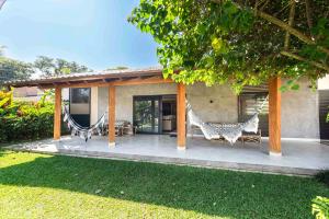 Casa dentro cond. Tenório à 50mts pé areia, térrea, ar cond split, área gourmet, cervejeira