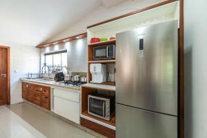 Casa dentro cond. Tenório à 50mts pé areia, térrea, ar cond split, área gourmet, cervejeira