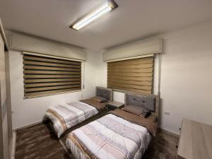 2BR Apartment in Tlaa Al Ali, Parking, AC, WIFI