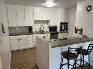 Sunny Condo Steps from Sand