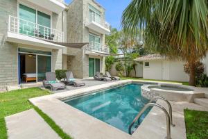Steps to Beach Condo with Pool