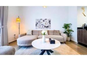 Elegant 1BR - Al Reef Urban Haven