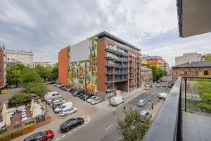 Bright Apartment Okrzei in Warsaw Near PGE by Noclegi Renters