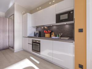 Dünenlounge - 5 Sterne Ferienwohnung mit West-Balkon und fantastischem Blick über den Deich