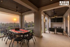 StayVista at The Amaryllis with Heated Pool & Projector Set-Up