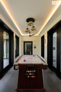 StayVista at The Amaryllis with Heated Pool & Projector Set-Up