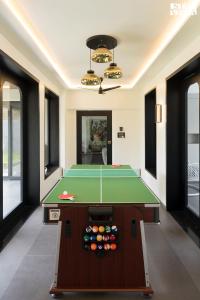 StayVista at The Amaryllis with Heated Pool & Projector Set-Up