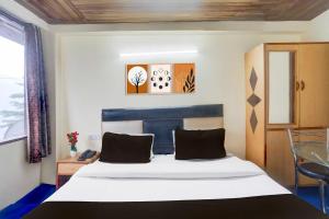 Collection O Simsa Near Kanyal Road
