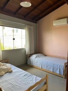 Casa com mezanino, de frente para o mar