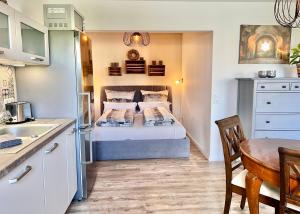 fewo1846 - Strandresidenz Wassersleben UferNest - modernes Studioapartment mit Balkon am Strand