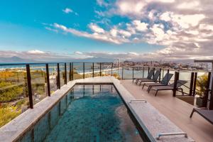 The Bridge by Xtay -Estúdios em Floripa com Piscina no Rooftop e Academia Completa, Próximos das Praias Populares