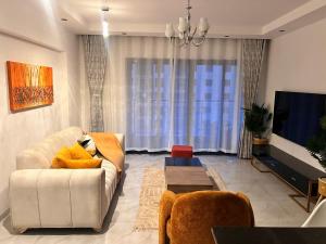 Modern, stylish, pristine apartment with fast WiFi, gym and pool in Lavington Nairobi